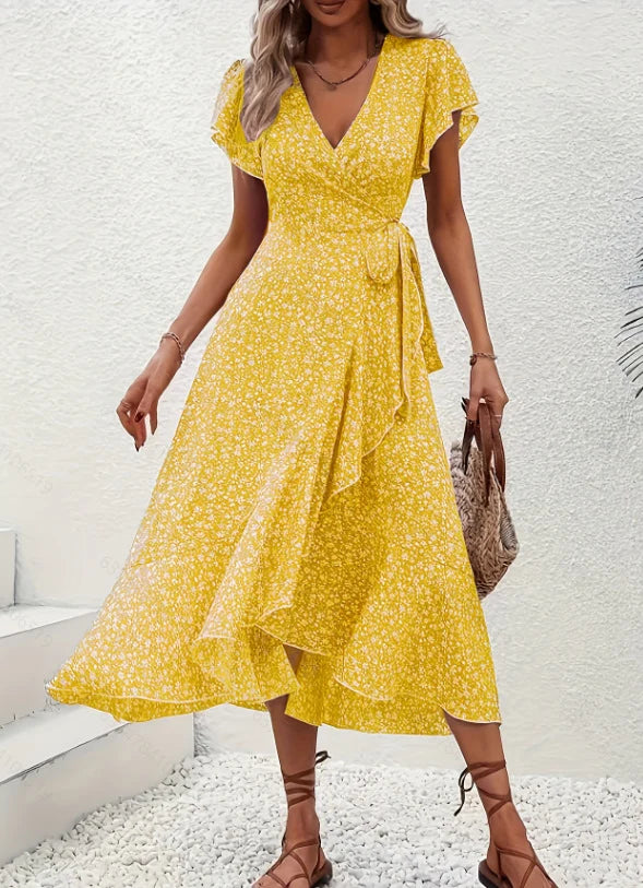 Kleid mit V-Ausschnitt und fließendem Saum
