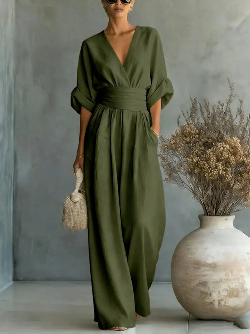 Eleganter Ärmelloser Jumpsuit mit Tiefem V-Ausschnitt, Taillenbund und Weitem Bein