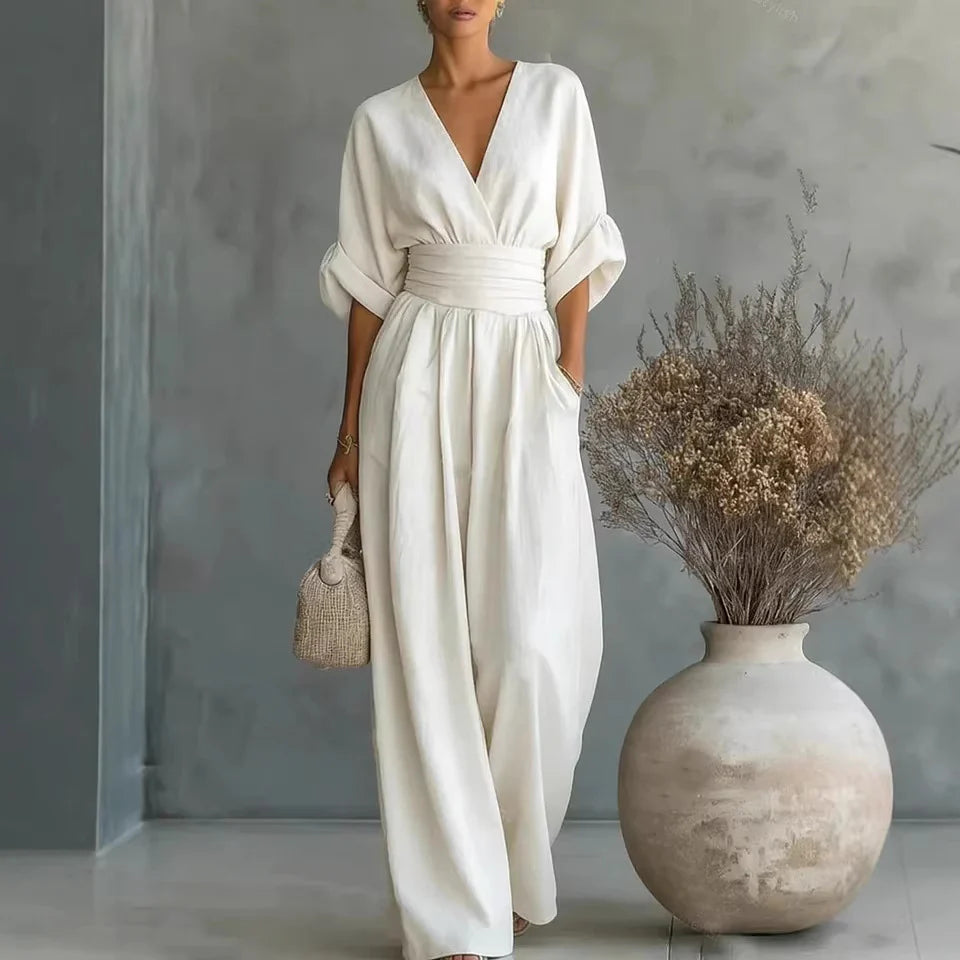 Eleganter Ärmelloser Jumpsuit mit Tiefem V-Ausschnitt, Taillenbund und Weitem Bein