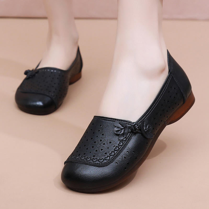 Zapatos de suela suave de goma flexible con perforaciones