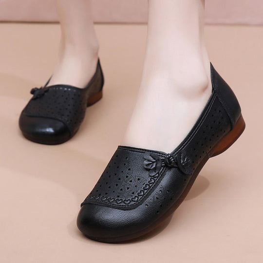 Zapatos de suela suave de goma flexible con perforaciones